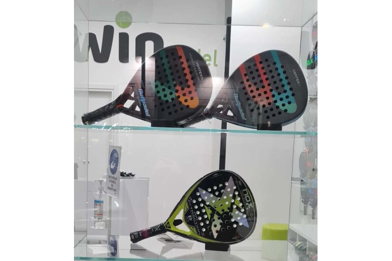 Premium padel racket displayed on horizontal ABS holder