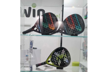 Premium padel racket displayed on horizontal ABS holder